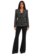Blazer de tweed con cinturón